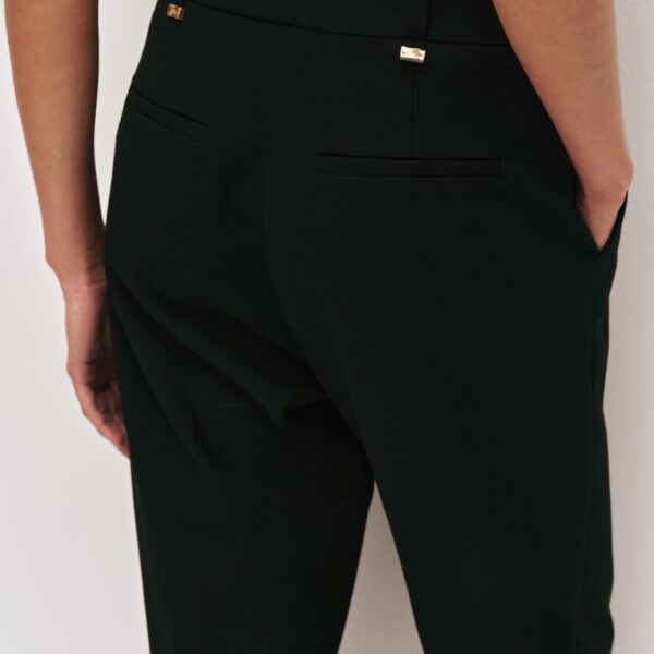 Aje Aus  – structured silhouette with raw femininity from Coveti