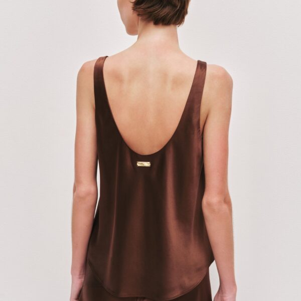 Aje Aus  – structured silhouette with raw femininity from Coveti