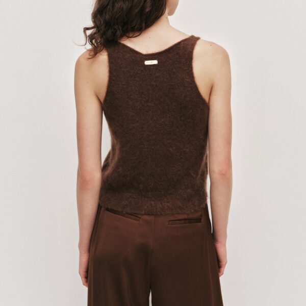Aje Aus  – structured silhouette with raw femininity from Coveti