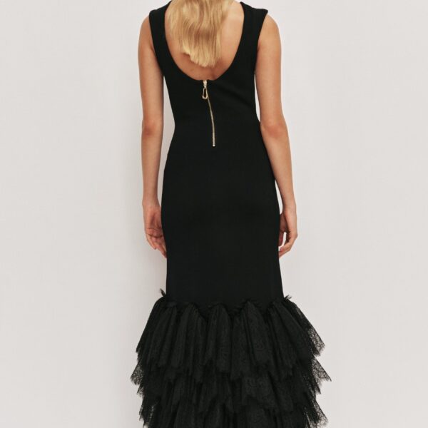 Aje Aus  – structured silhouette with raw femininity from Coveti