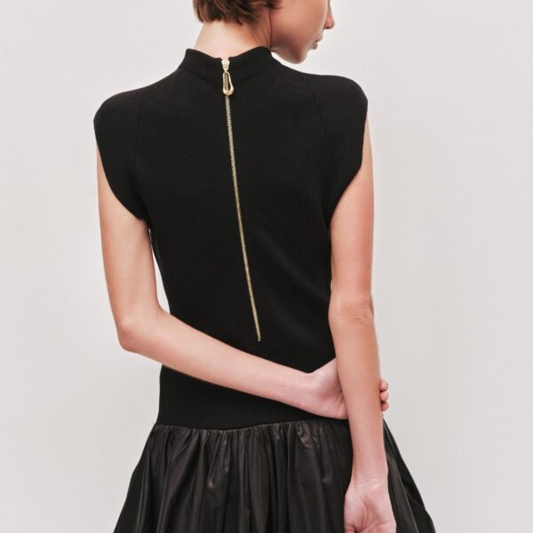 Aje Aus  – structured silhouette with raw femininity from Coveti