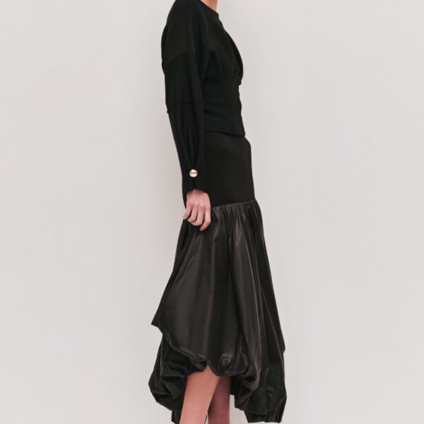 Aje Aus  – structured silhouette with raw femininity from Coveti