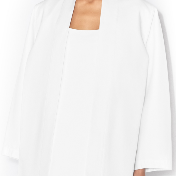 Alaïa Asymmetric Poplin Coat - ALAÏA Coats - Laser Cut Luxury - Shop at Coveti