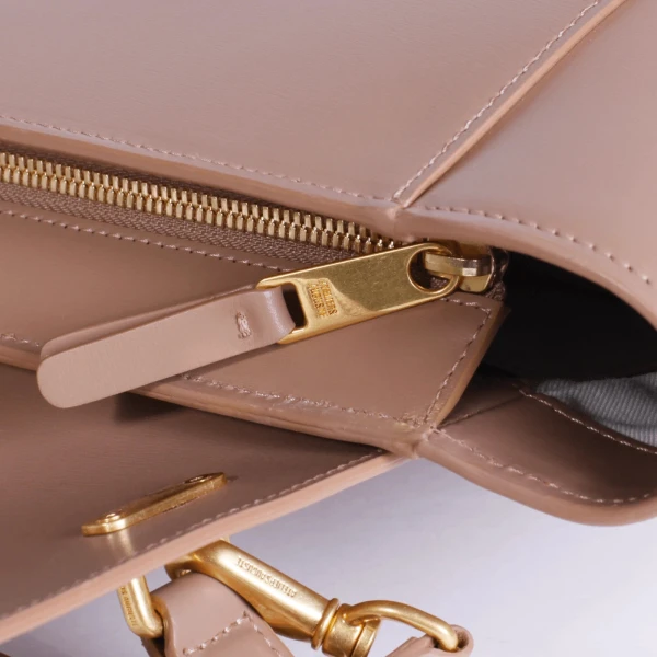 Ateliers Auguste Marly in Taupe bag