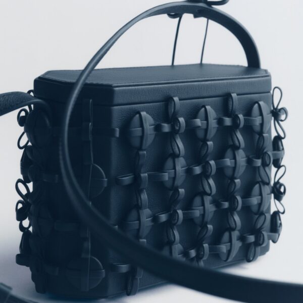 Polène Button Bow Box in Ink Button Bow Box in Ink - Clutch Bags - Parisian Luxury Leather Bag at Coveti