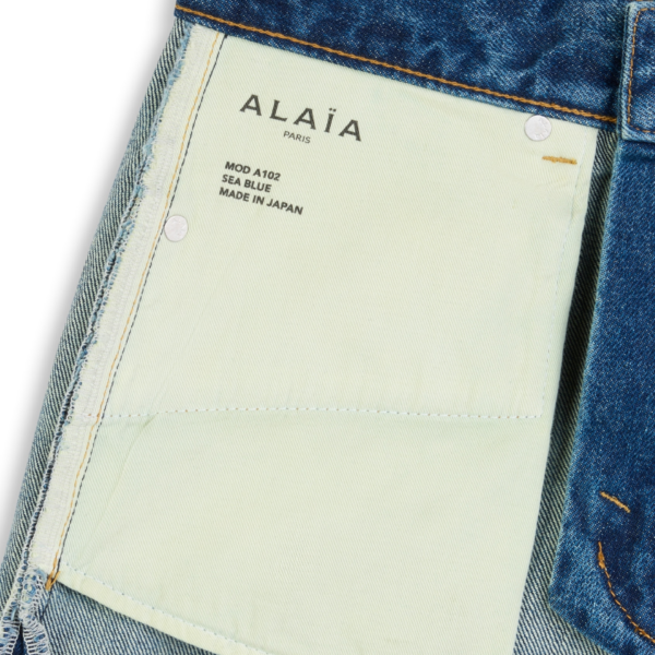 Alaïa Bootcut Denim Jeans - ALAÏA Pants - Laser Cut Luxury - Shop at Coveti