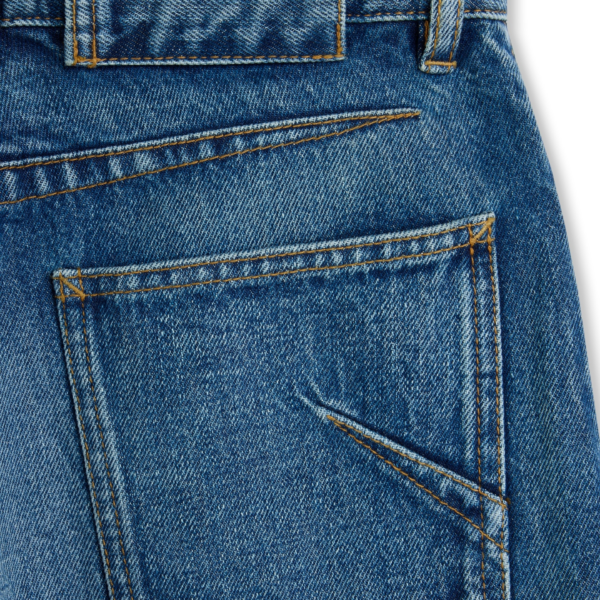 Alaïa Bootcut Denim Jeans - ALAÏA Pants - Laser Cut Luxury - Shop at Coveti
