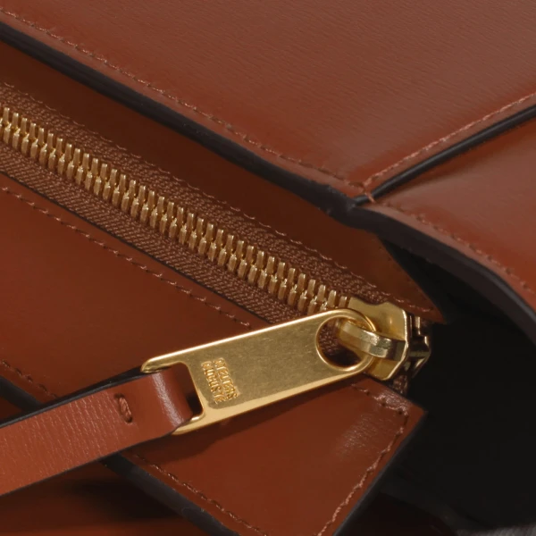 Ateliers Auguste Marly in Tan bag