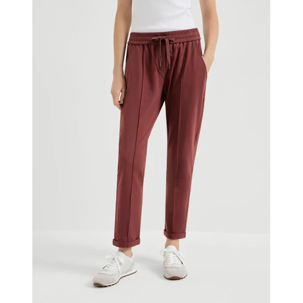 Track trousers with monili