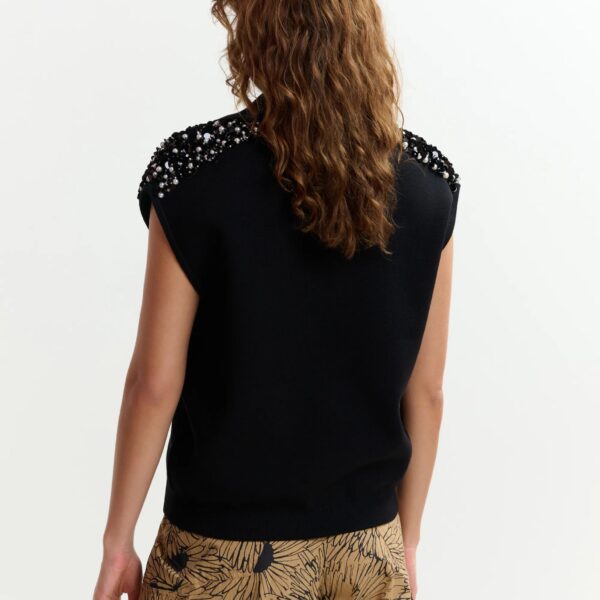 Belgian designer tops