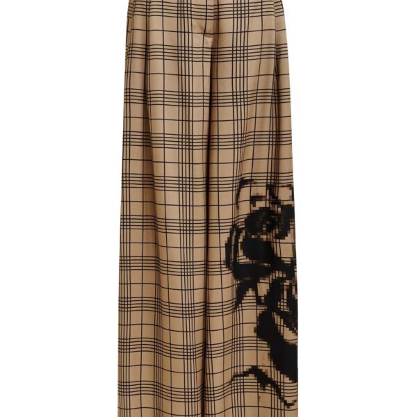 Brown and black checked wide-leg pants with placed print