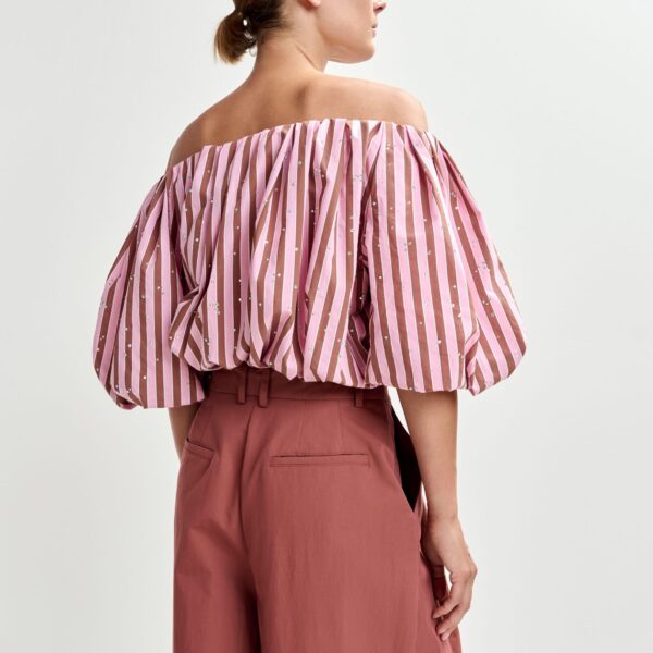 Belgian designer tops