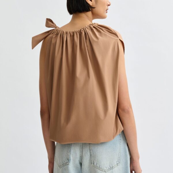 Belgian designer tops