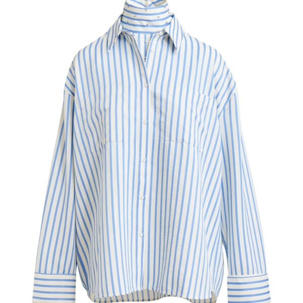 Light blue and off-white oversized shirt with rhinestone embellishments and layered bib
