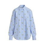 Light blue and white striped oversized cotton shirt with yellow Peanuts™ print