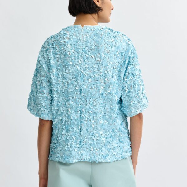 Belgian designer tops