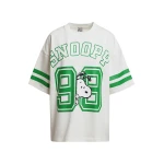 Off-white T-shirt with Peanuts™ Snoopy print and green text