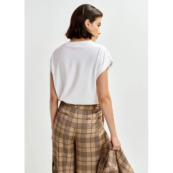 Belgian designer tops