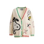 Off-white knit cardigan with multicolored Peanuts™ Snoopy and Woodstock patches