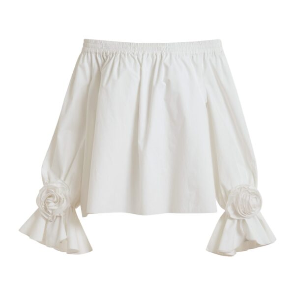Off-white strapless cotton top with rosette details