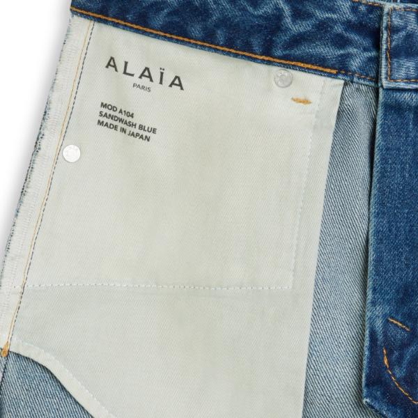 Alaïa Flare Denim Jeans - ALAÏA Pants - Laser Cut Luxury - Shop at Coveti