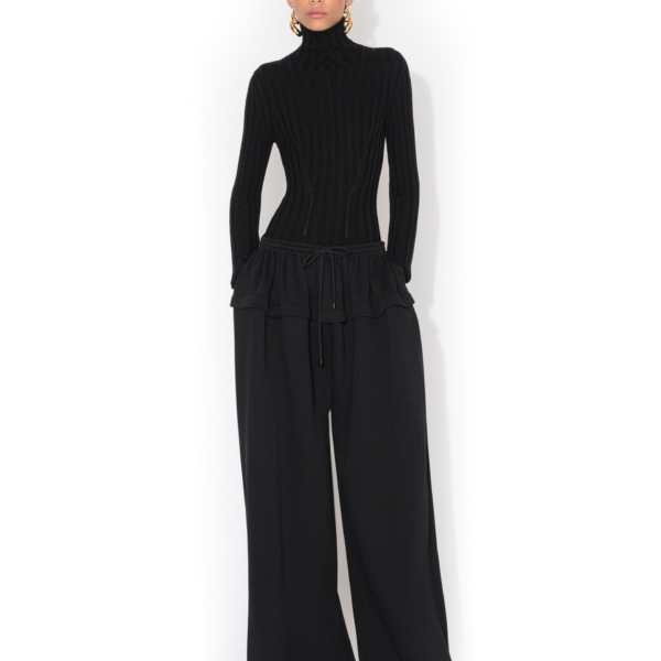 Alaïa Peplum Fleece Pants - ALAÏA Pants - Laser Cut Luxury - Shop at Coveti