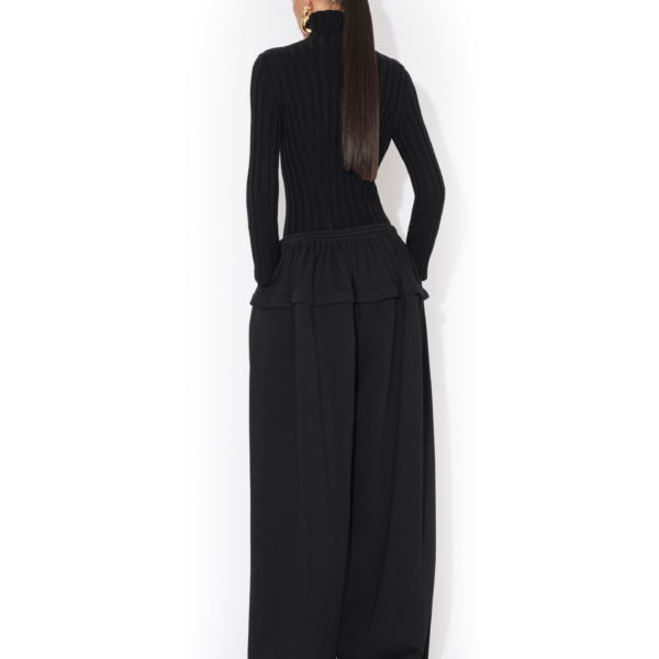 Alaïa Peplum Fleece Pants - ALAÏA Pants - Laser Cut Luxury - Shop at Coveti