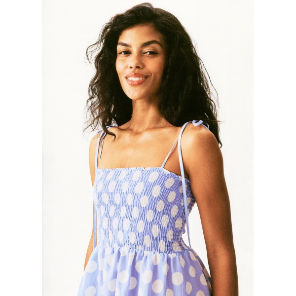 Sleeper white on blue polka dot dress