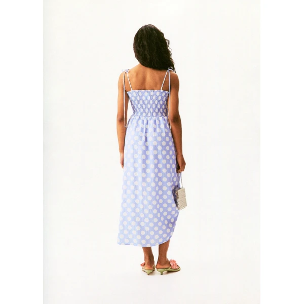 atlanta strap dress with rose in white on blue polka dot