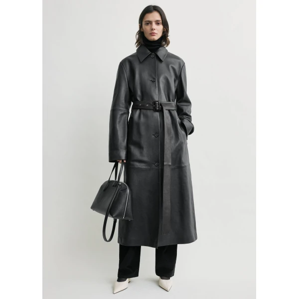 Totême Belted leather coat in Black - Coats - Scandinavian Minimalist Luxury at Coveti