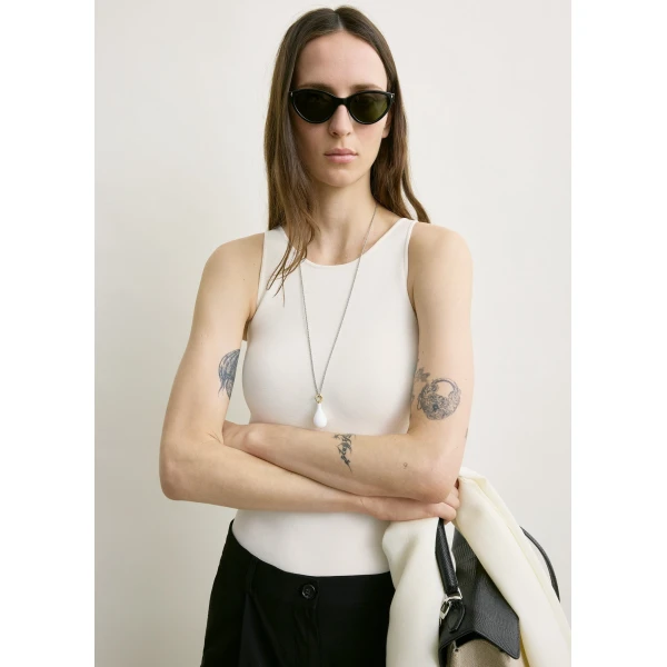 Totême Classic compact knit tank in White - Knitwear - Scandinavian Minimalist Luxury at Coveti