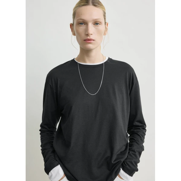 Totême Classic long-sleeve tee in Black - Tops - Scandinavian Minimalist Luxury at Coveti