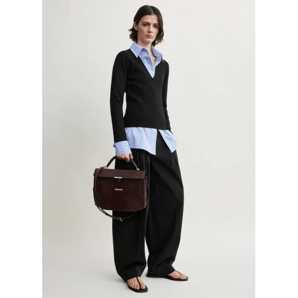 Totême Compact knit v-neck in Black - Knitwear - Scandinavian Minimalist Luxury at Coveti