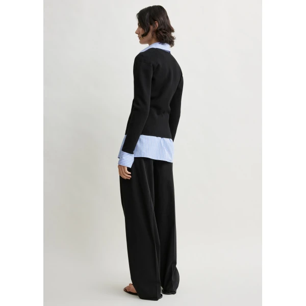 Totême Compact knit v-neck in Black - Knitwear - Scandinavian Minimalist Luxury at Coveti