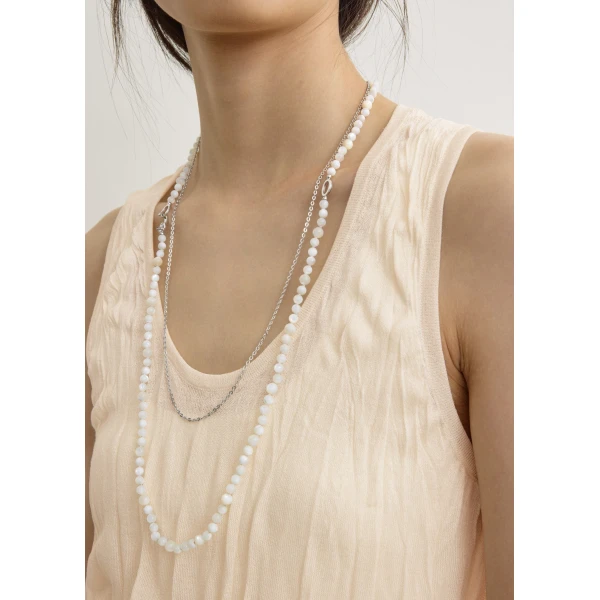 Totême Crinkled knit tank in Pale apricot - Knitwear - Scandinavian Minimalist Luxury at Coveti
