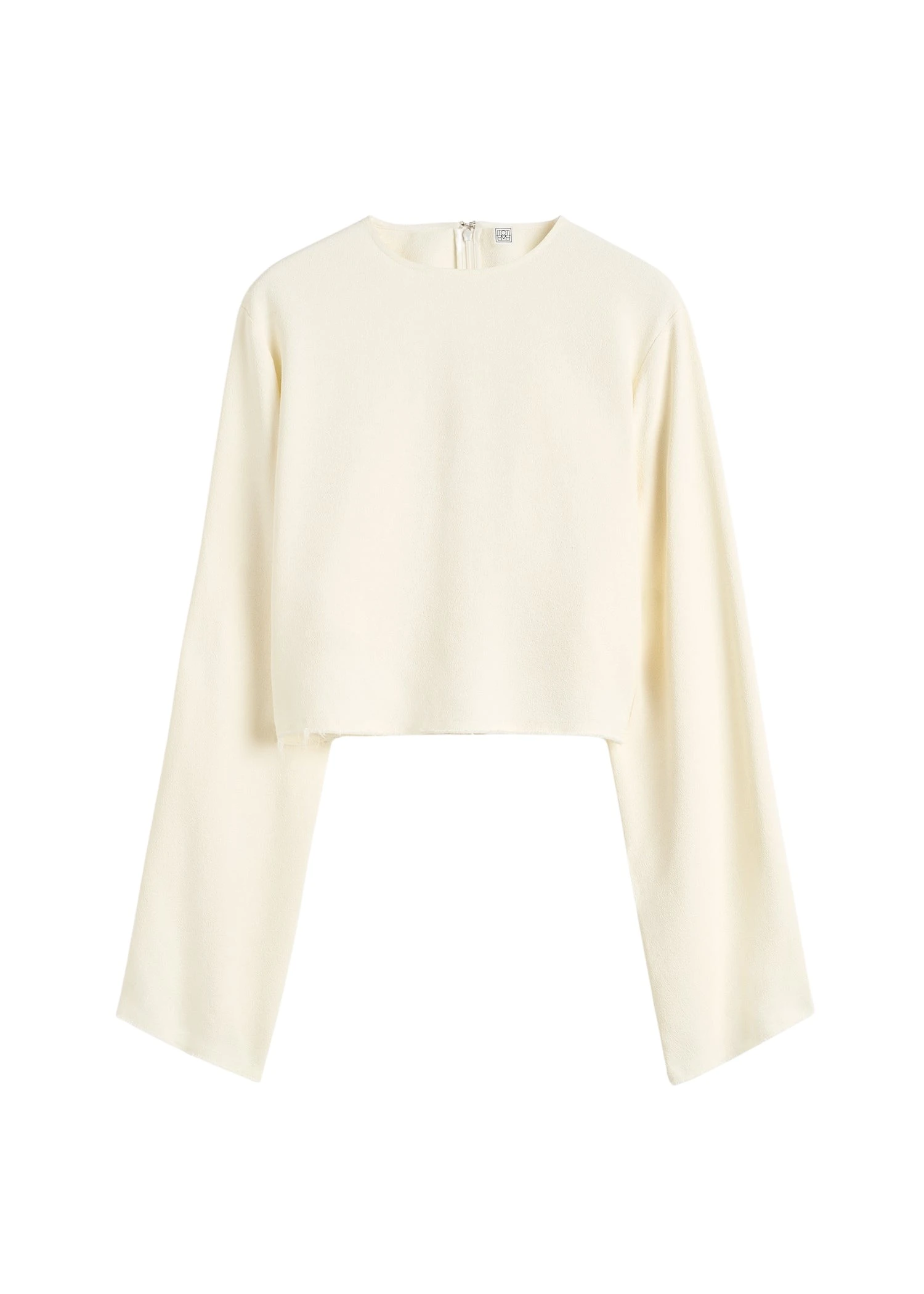 Toteme-Cropped-sable-blouse-in-Macadamia73428_nobg Totême Cropped sablé blouse in Macadamia - Tops - Scandinavian Minimalist Luxury at Coveti