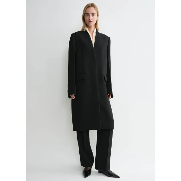Totême Deep pleat coat in Black - Coats - Scandinavian Minimalist Luxury at Coveti