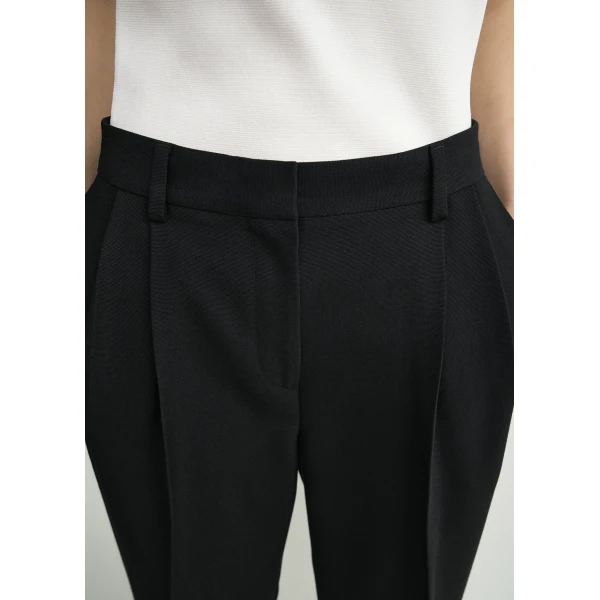 Totême Double-pleat tailored trousers in Black - Pants - Scandinavian Minimalist Luxury at Coveti