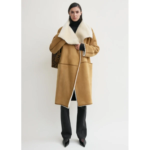 Totême Draped shearling coat in Tan - Coats - Scandinavian Minimalist Luxury at Coveti