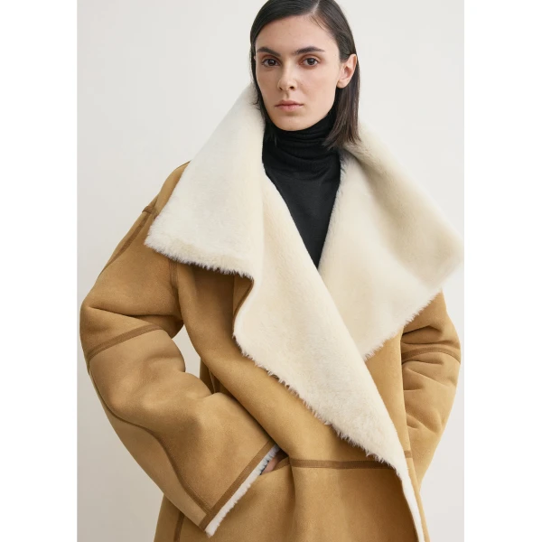 Totême Draped shearling coat in Tan - Coats - Scandinavian Minimalist Luxury at Coveti