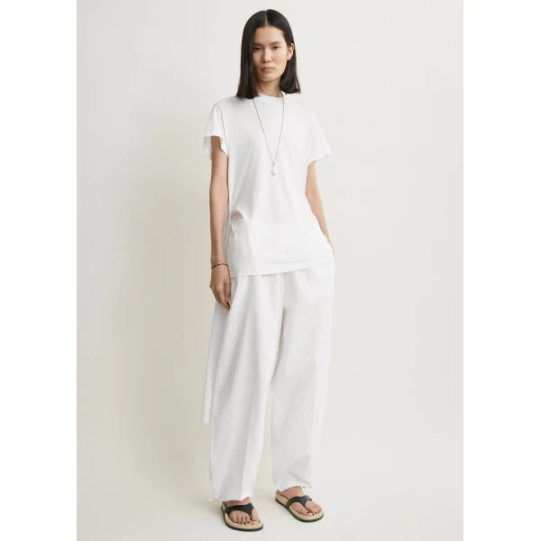 Totême Drawstring cotton trousers in White - Pants - Scandinavian Minimalist Luxury at Coveti