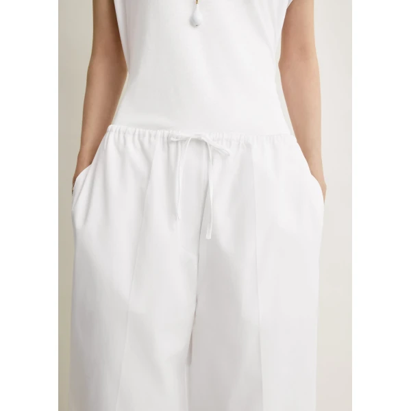 Totême Drawstring cotton trousers in White - Pants - Scandinavian Minimalist Luxury at Coveti