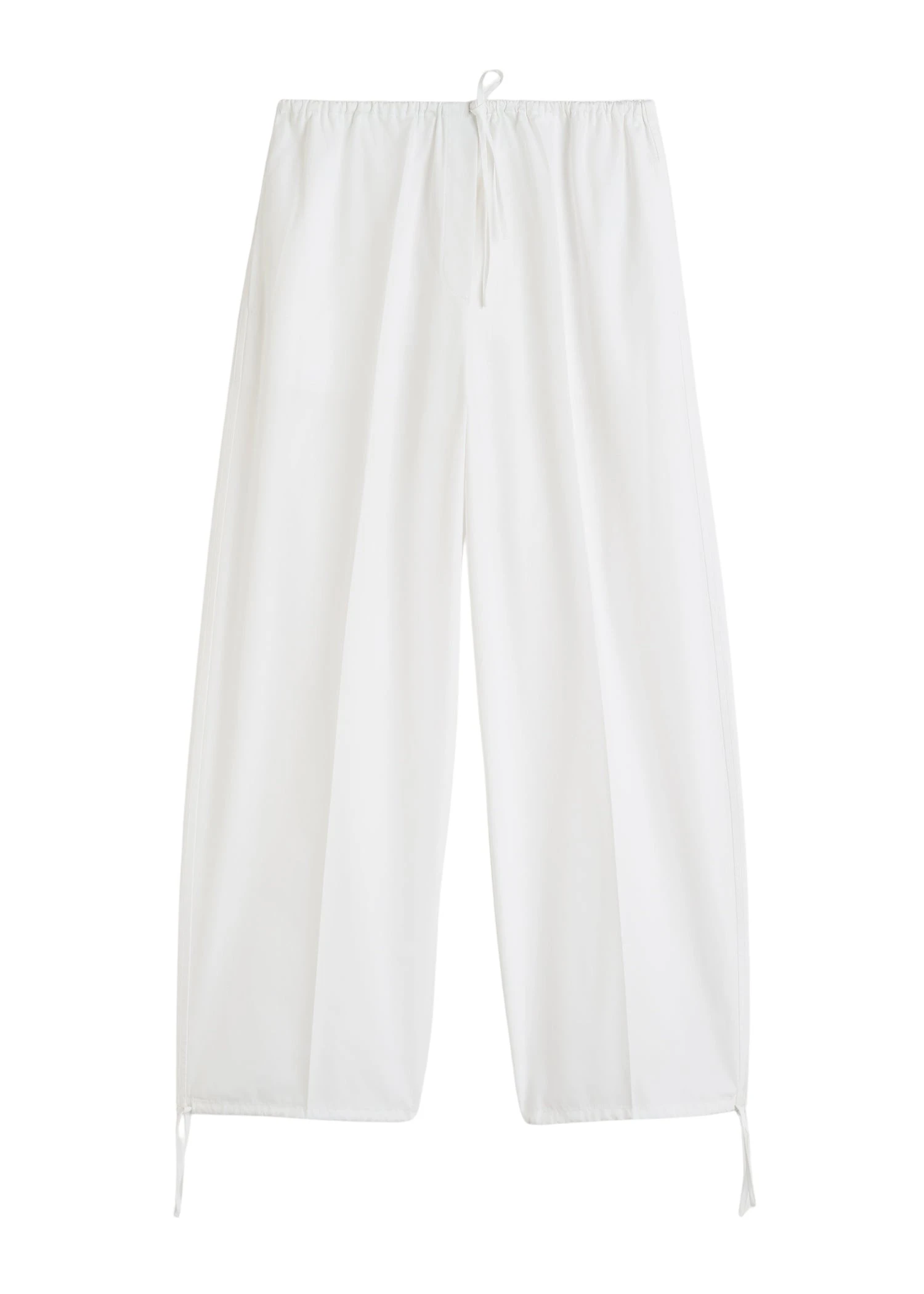 Toteme-Drawstring-cotton-trousers-in-White90179_nobg Totême Drawstring cotton trousers in White - Pants - Scandinavian Minimalist Luxury at Coveti