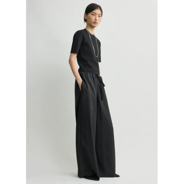 Totême Drawstring dinner trousers in Black - Pants - Scandinavian Minimalist Luxury at Coveti