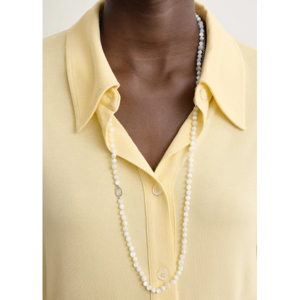 Totême Fitted jersey shirt in Buttercup - Tops - Scandinavian Minimalist Luxury at Coveti