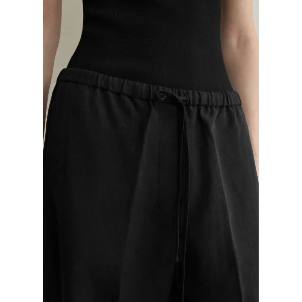 Totême Fluid drawstring trousers in Black - Pants - Scandinavian Minimalist Luxury at Coveti