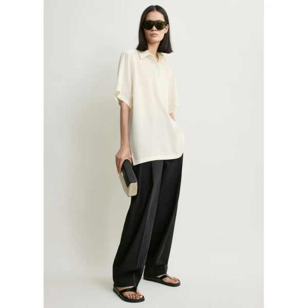 Totême Fluid polo shirt in Ecru - Tops - Scandinavian Minimalist Luxury at Coveti