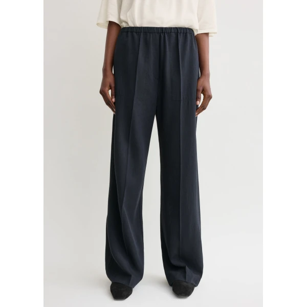 Totême Fluid winter trousers in Navy - Pants - Scandinavian Minimalist Luxury at Coveti