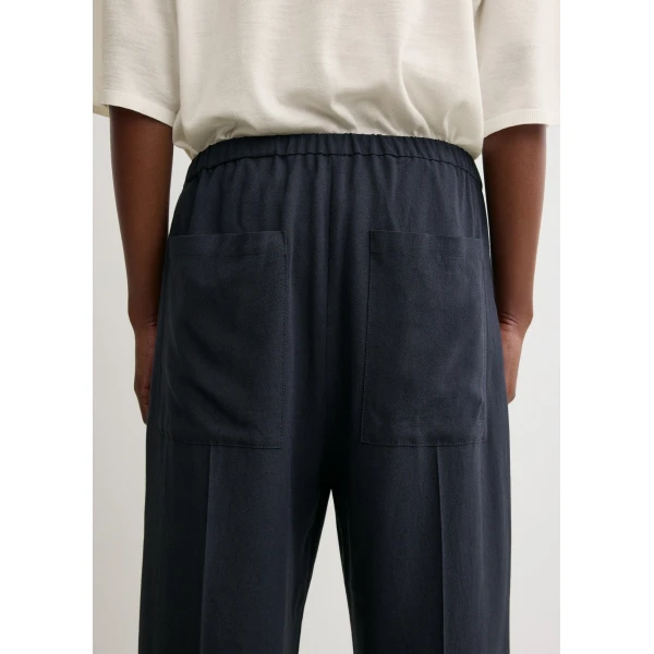 Totême Fluid winter trousers in Navy - Pants - Scandinavian Minimalist Luxury at Coveti