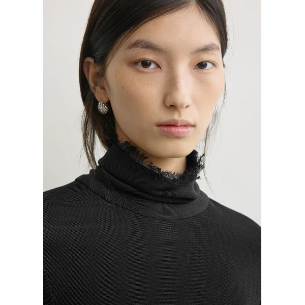 Totême Frayed-edge slim top in Black - Tops - Scandinavian Minimalist Luxury at Coveti